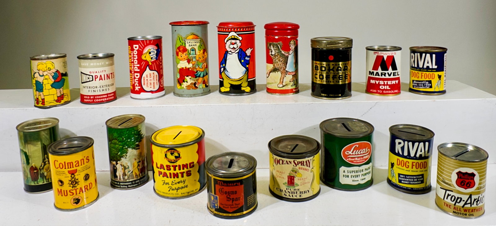 Eighteen Tin Cylinder Can Banks - Many Advertising Products (1 of 2)