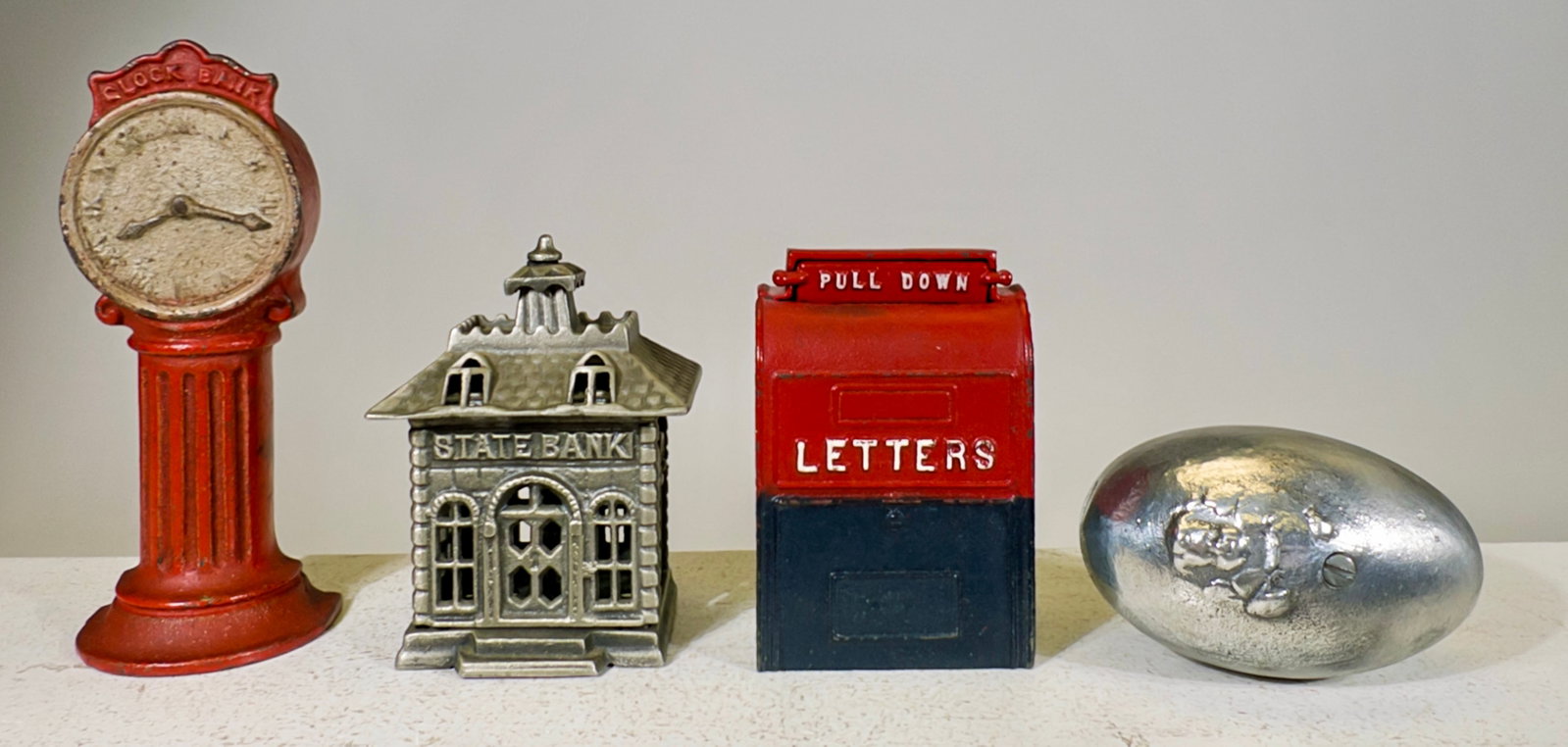 Four Assorted Still Banks (1 of 2)