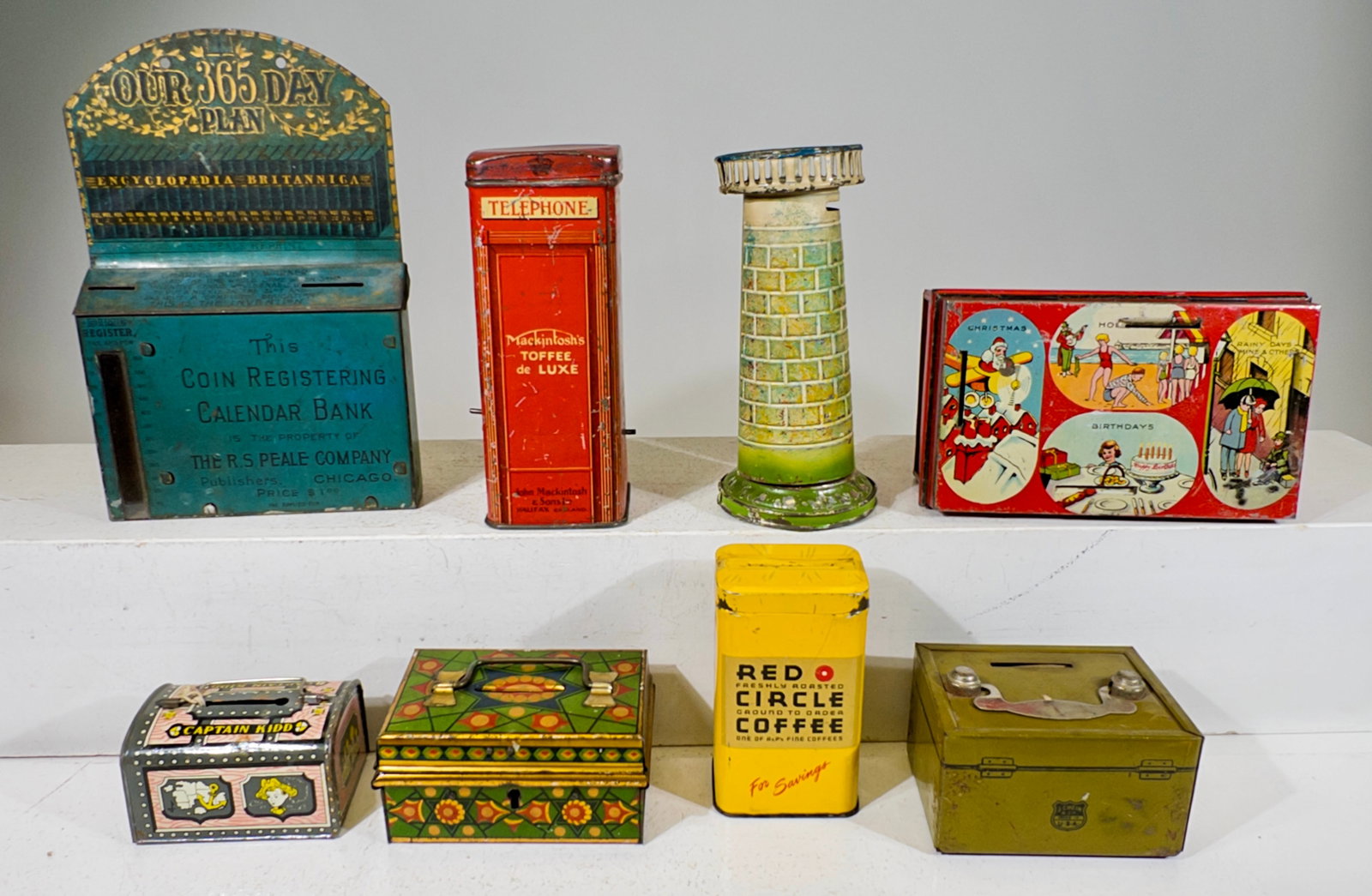 Eight Assorted Tin Banks