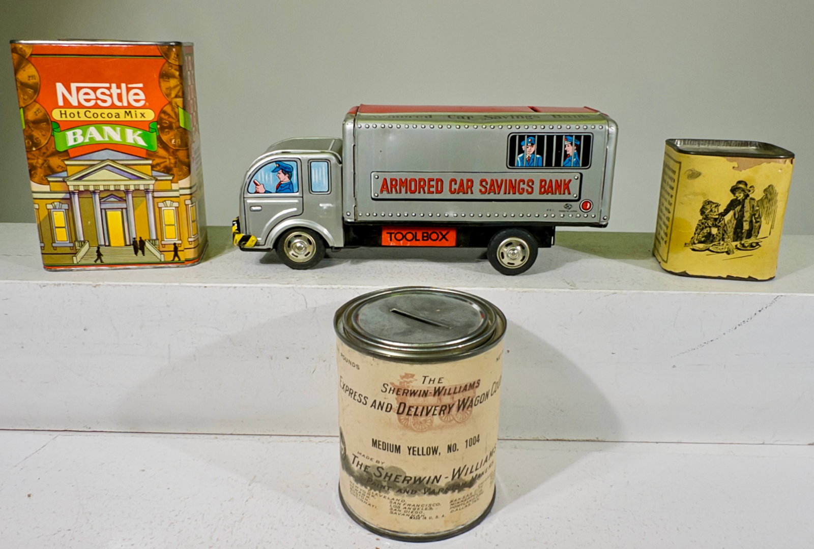 Four Tin Still Banks - Some with Paper Labels (1 of 2)