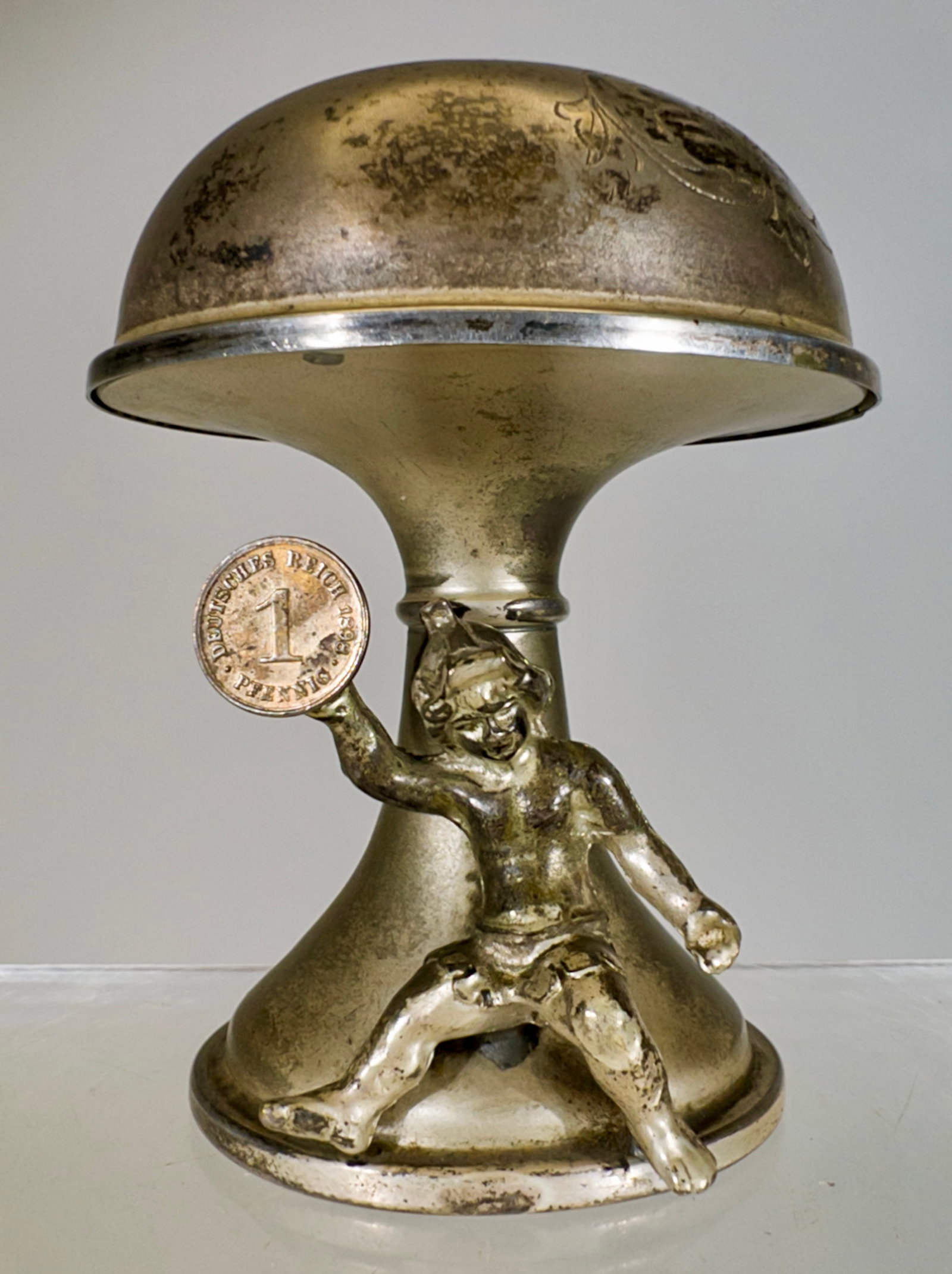 Elf under a Mushroom Bank - Silvered Tin: German 1898 - 4 1/2"T