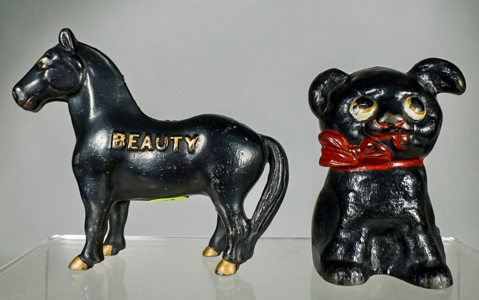 Beauty / Cutie Cast Iron Banks (1 of 2)
