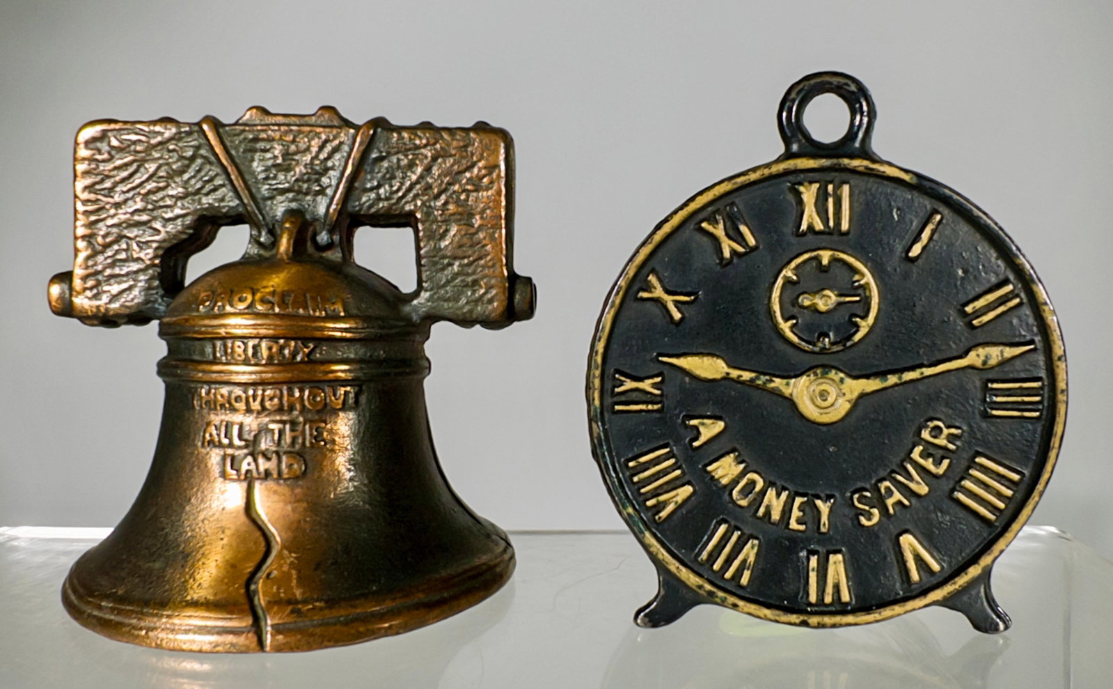 Money Saver Clock / Iowa Woman's Dept. Bell (1 of 2)