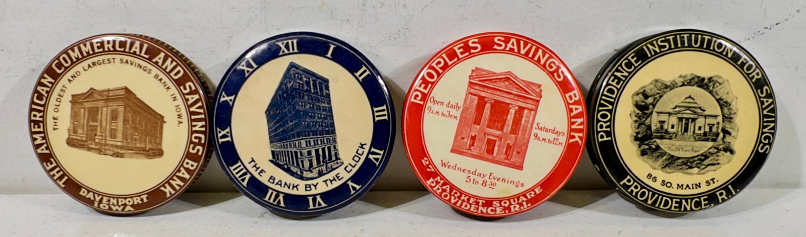 Four Celluloid Dime Register Banks with Images of Bank (1 of 2)