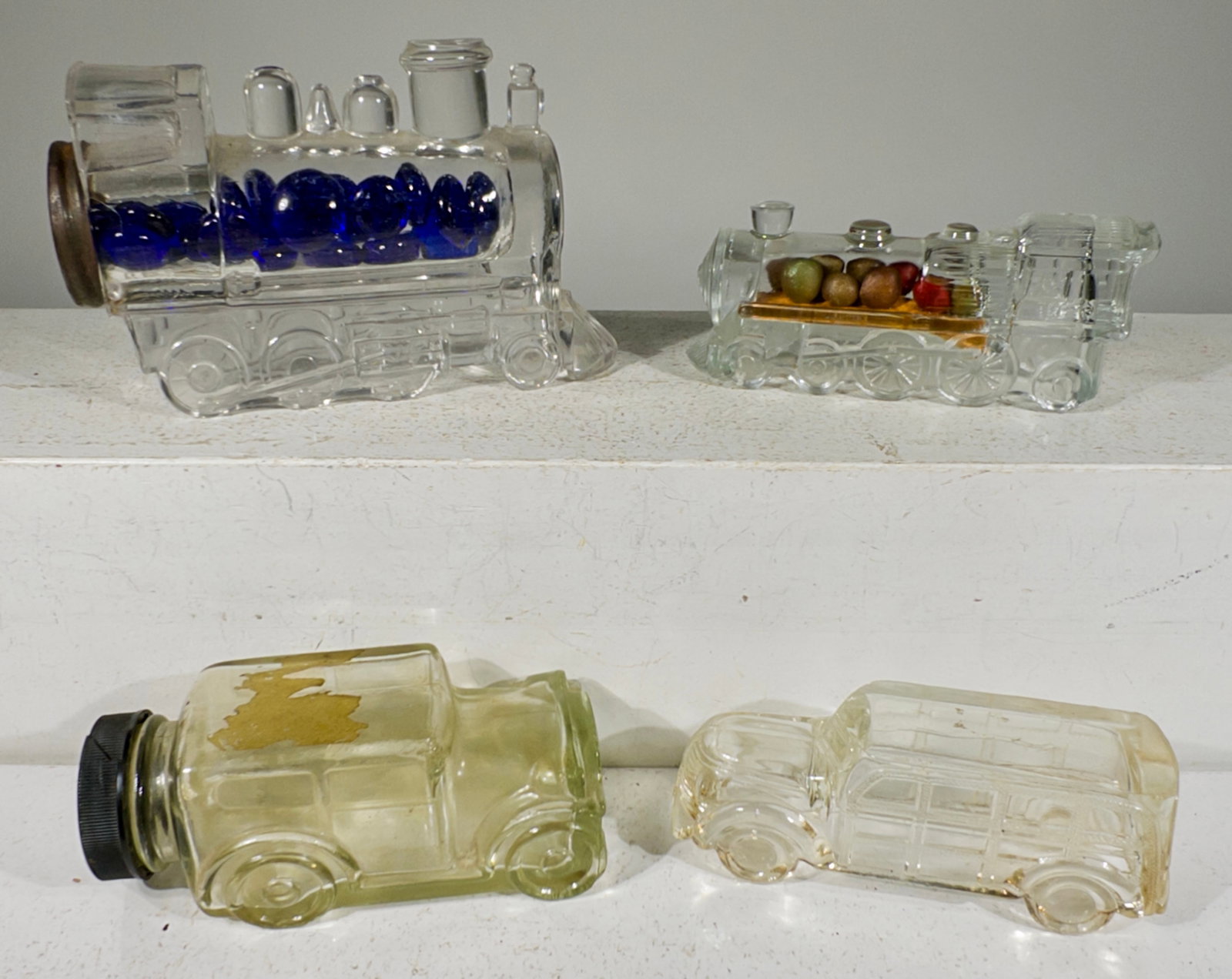 Two Auto / Two Train Engine - Glass Candy Containers: American 1930/40's - Longest is 6 1/4"