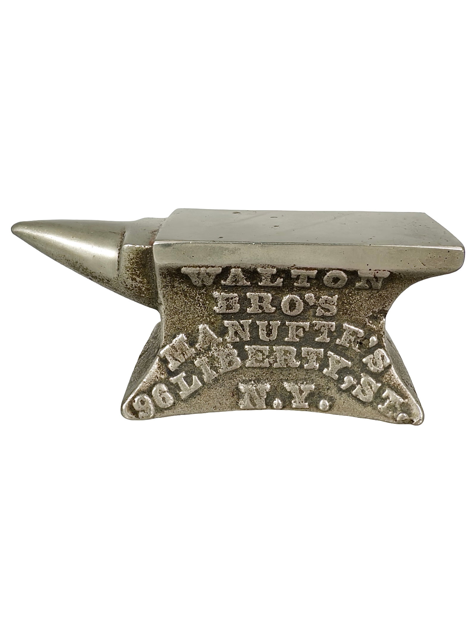 Walton Bro's Manutfr's Advertising Paperweight - Cast Iron: 96 Liberty St. - New York - Circa 1910's. 1 3/4" Tall x 4 1/4" Long. The Peirce Collection.