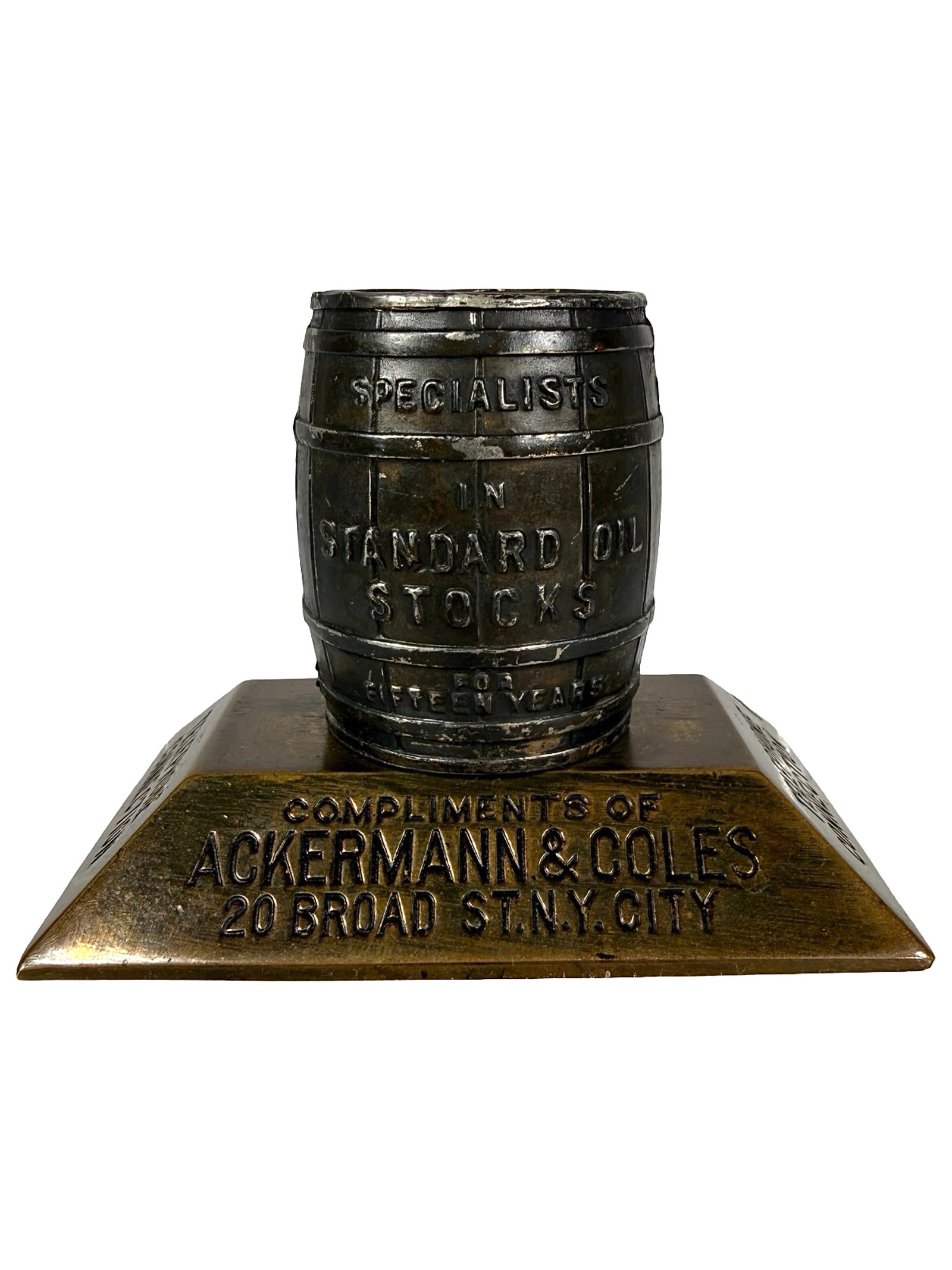 Ackermann & Coles - Specialists in Standard Oil Stocks: 20 Broad St. N. Y. City. 1940's - Brass. 2 1/2" Tall x 3 1/2" Wide. The Peirce Collection.