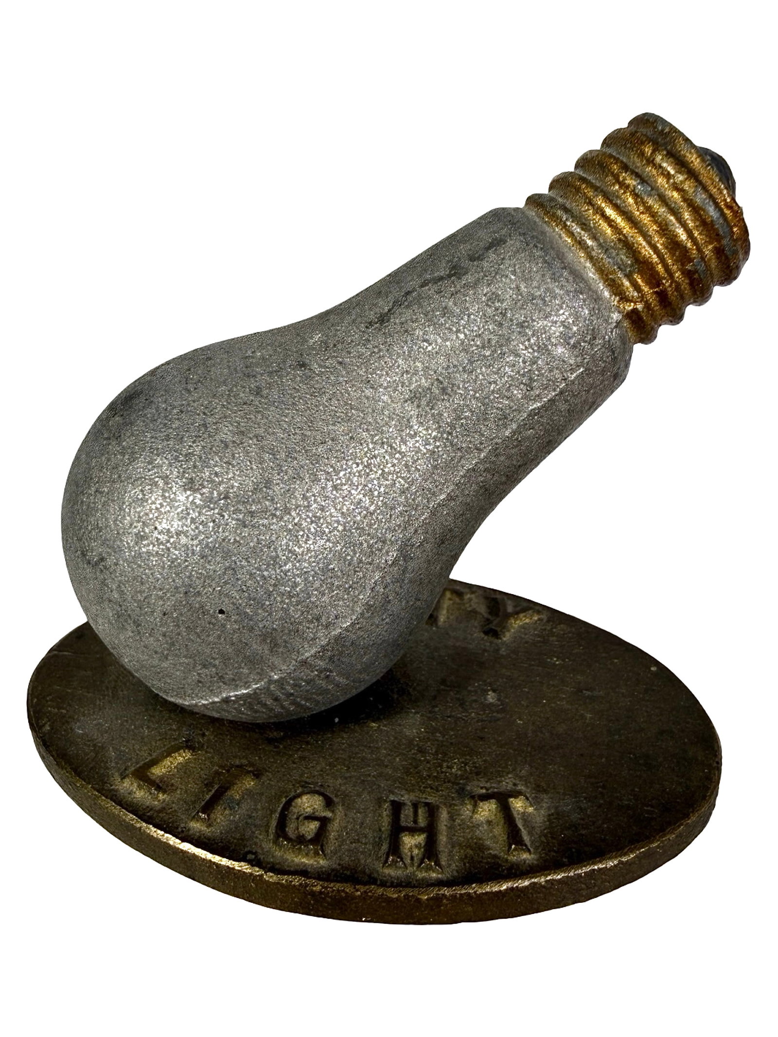 City Light - Advertising Paperweight: Made of an Alloy Material. American - Circa 1930's. 2 3/8" Tall x 3" Wide. The Peirce Collection.