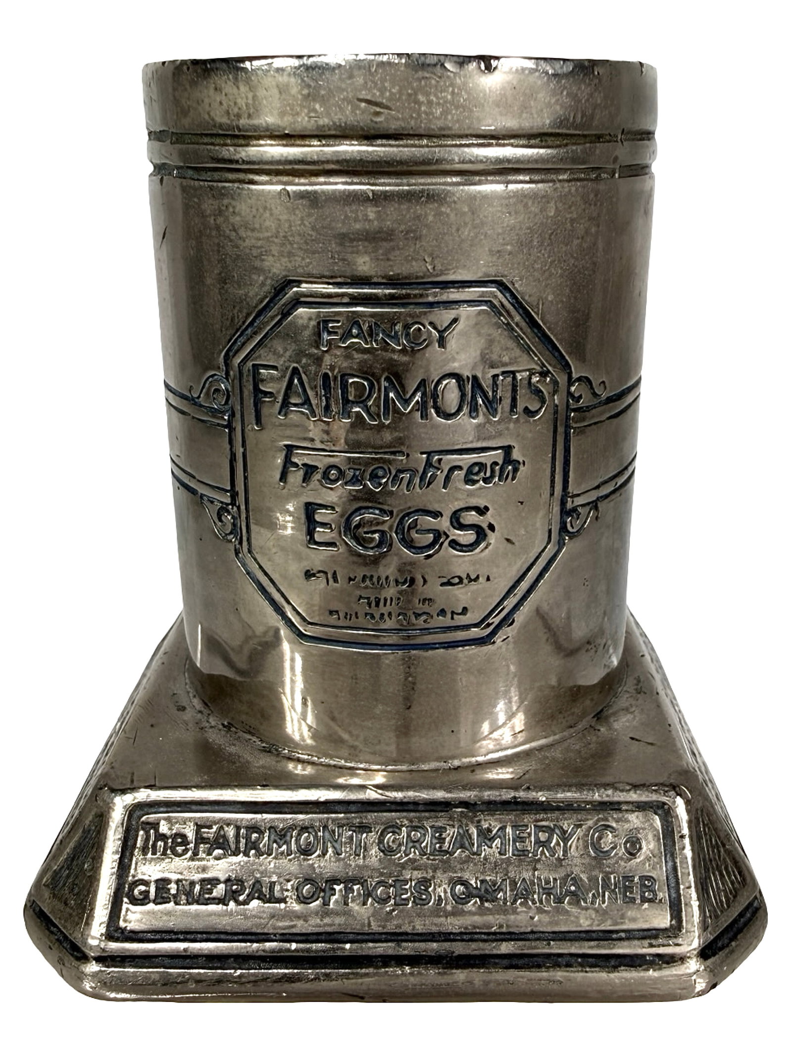 The Fairmont Creamery Co. - Advertising Paperweight - Lead: Omaha, Ne. - Circa 1930/40's. 3 1/4" Tall x 2 3/4" Wide. The Peirce Collection.
