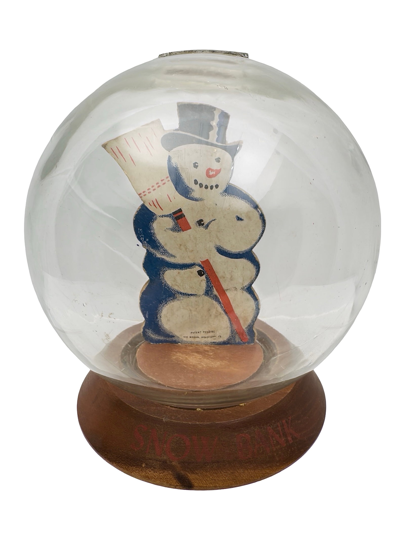 Snow Bank Bubble Bank: By Vic Moran Company. Bradford, Pa. - 1940 - 6 1/2" Tall. The Peirce Collection.