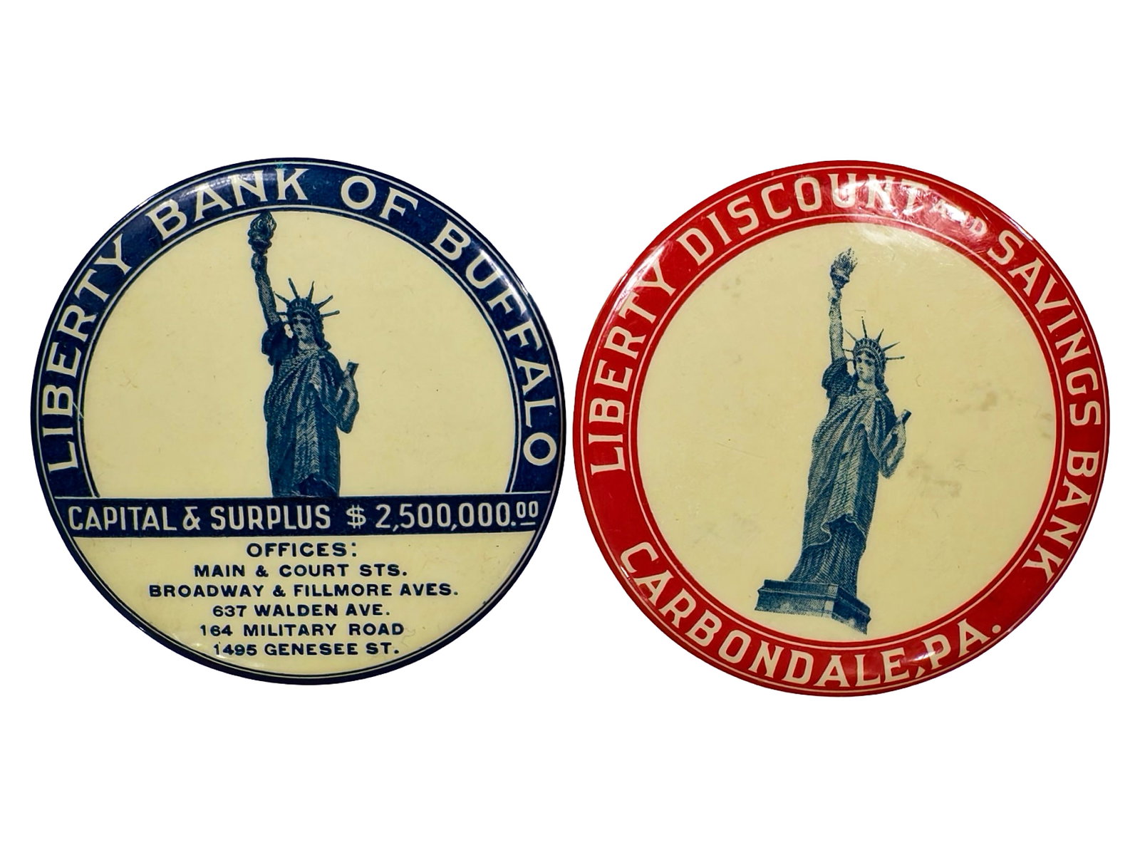 Two Celluloid Pocket Dime Banks: Statue of Liberty Images. American - 1920's - 2 1/2" Circular. The Peirce Collection.