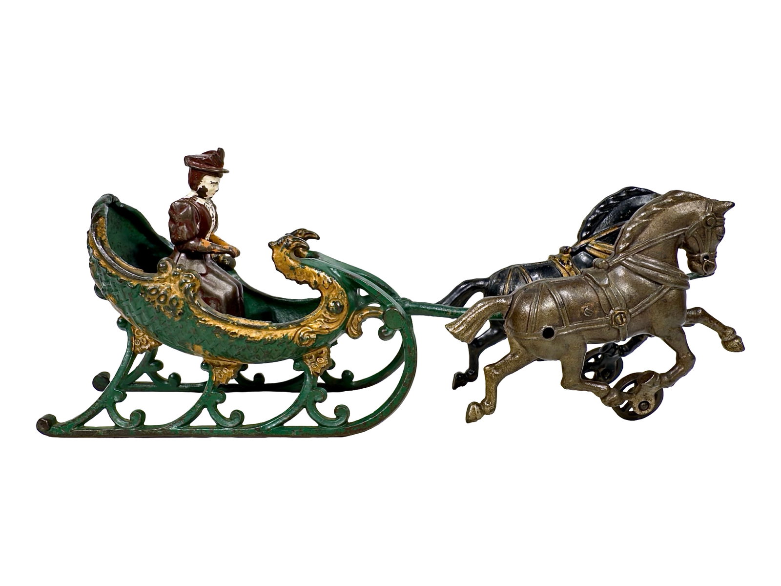 Two Horse Green & Gold Sleigh - Cast Iron Toy: Made by the Hubley Mfg. Company. Lancaster, Pa. - Ca. 1906 - 15" Long. Hubley also utilized this ornate carriage for the production of its Santa Sleigh. Of course, they switched out the team of