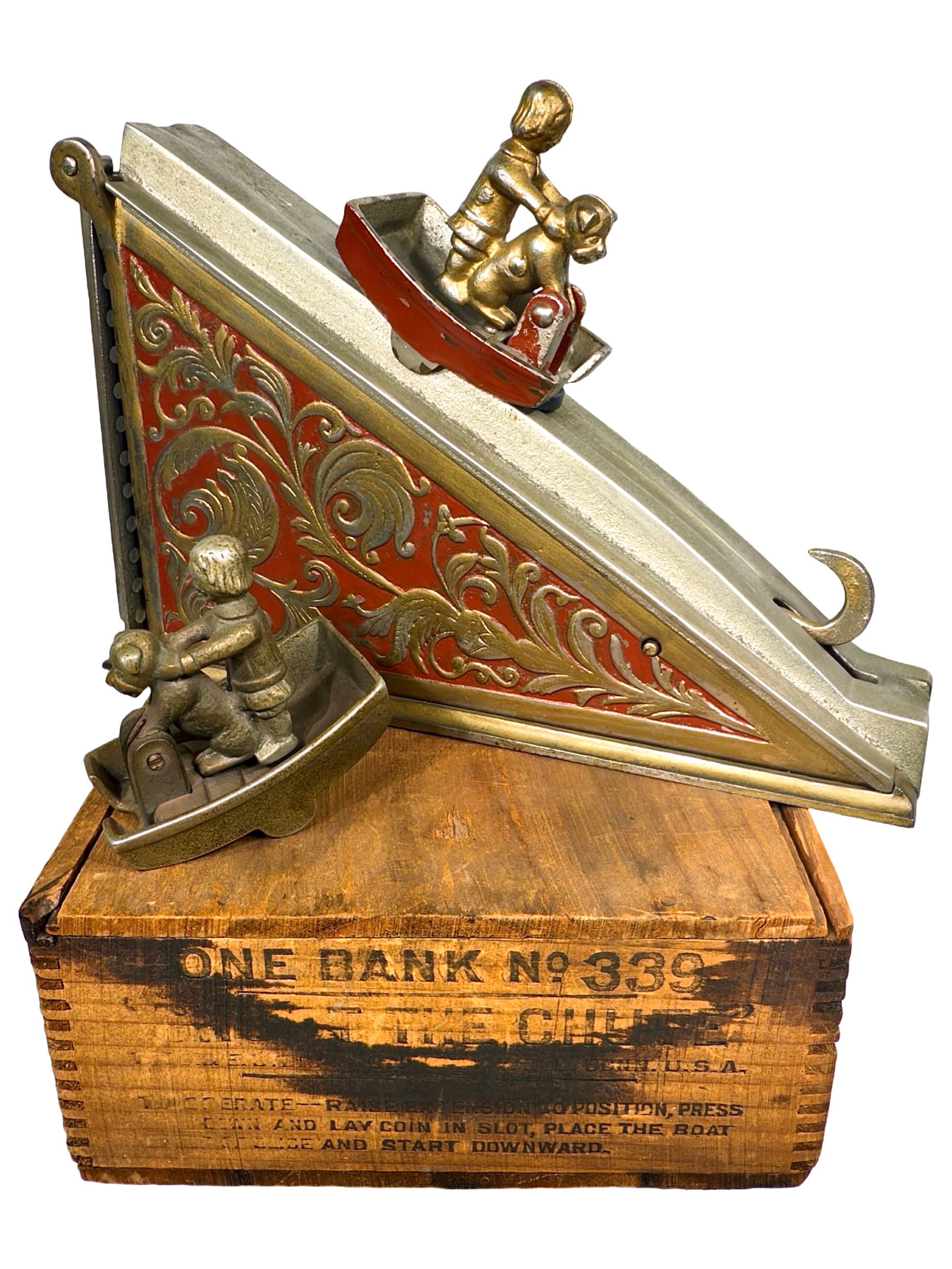 Shoot the Chute Bank - Very Rare with Original Box: Comes with Two Carts. By J. & E. Stevens Company. Cromwell, Ct. - Circa 1906. This appears to be an original, 1st series production of the bank. We come to this conclusion for two reasons: the fine de