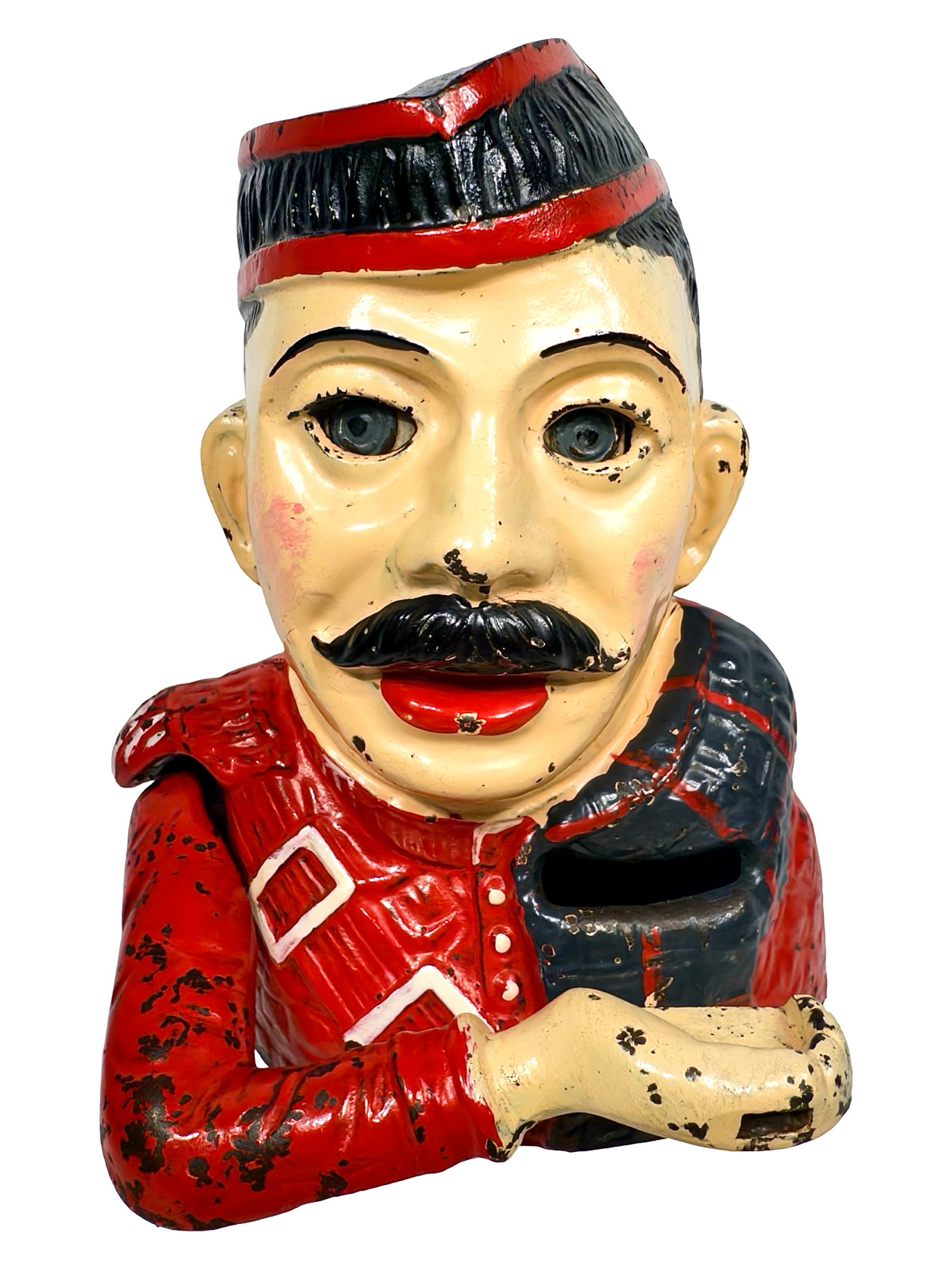 The Kiltie Bank: By John Harper & Company. Great Britain - Circa 1931. The Kiltie Bank is a late production toy bank that uses the same technology as classic coin swallowers, but in this case, the hand raised to drop 