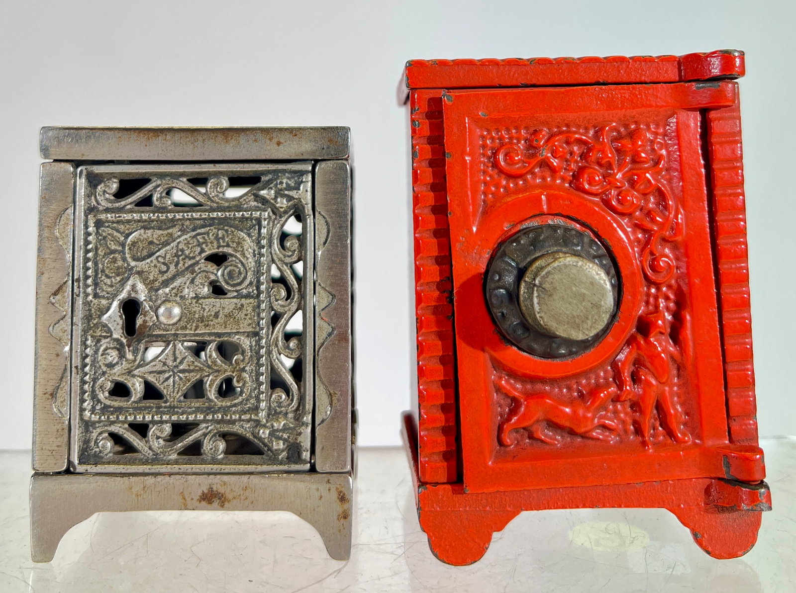 Two Cast Iron Safe Banks - Red/Orange Safe is Scarce (1 of 3)