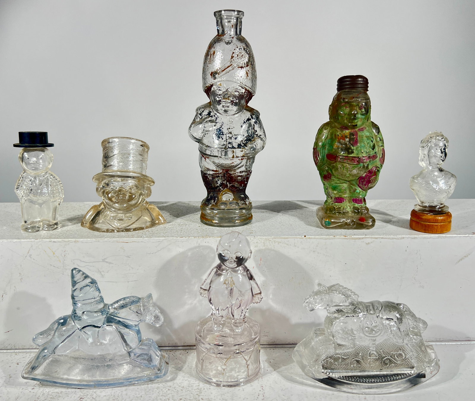 Eight Assorted Figural Glass Candy Containers- Several Missing tops or bottoms: American- 1930/40's- Tallest is 7 1/2"