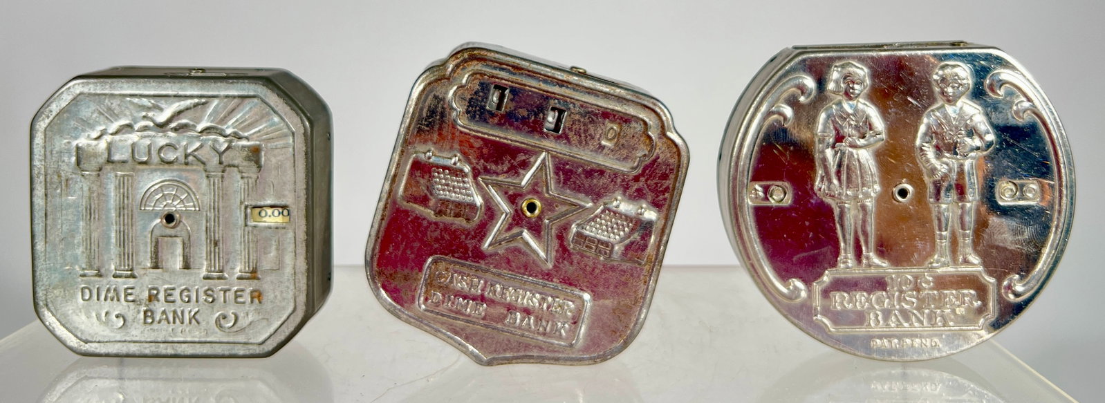 Three Silver Tin Pocket Dime Register Banks (1 of 2)