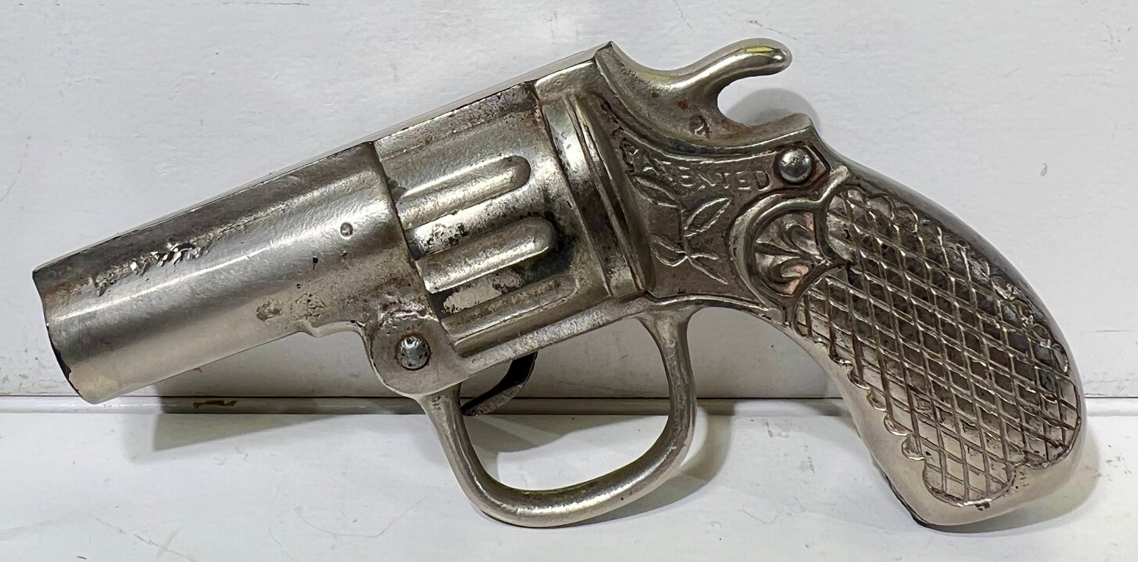 Pistol Bank Cast Iron Version - Scarce: By Richard Elliot Co. - Chicago, IL. 1909 - 5 5/8"W x 3 3/8"T - The Peirce Collection
