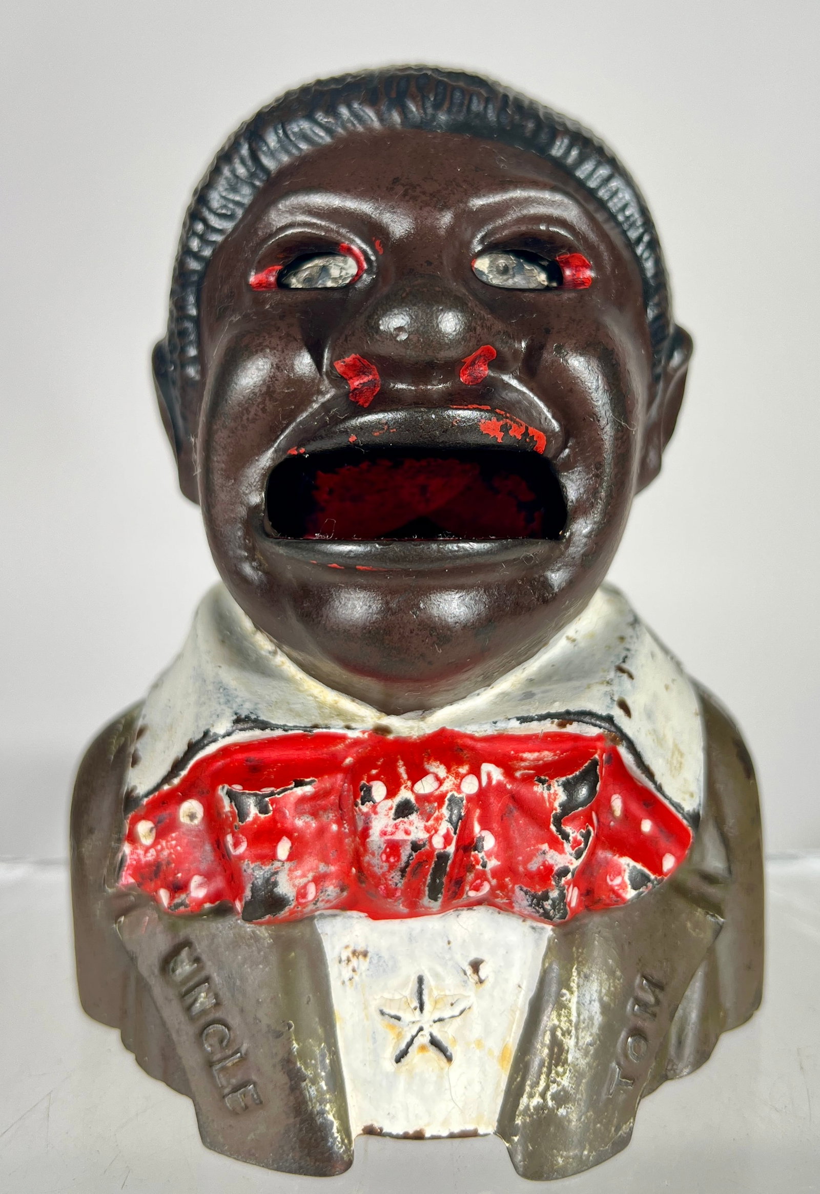Uncle Tom with Lapels and Star: Kyser and Rex Co. - Philadelphia 1880's - 4"W x 5 1/4"T - The Peirce Collection