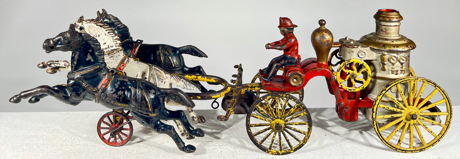 Wilkins Three Horse Fire Pumper with Integral Driver - Scarce: Wilkins Hardware - Keene, NH. 1900 - 20"L x 7"T - The Olshefski Collection