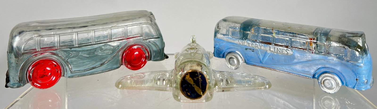 Two Bus / Fighter Plane Glass Candy Containers: American 1930/40's - All 4 1/2" to 5"L - The Peirce Collection