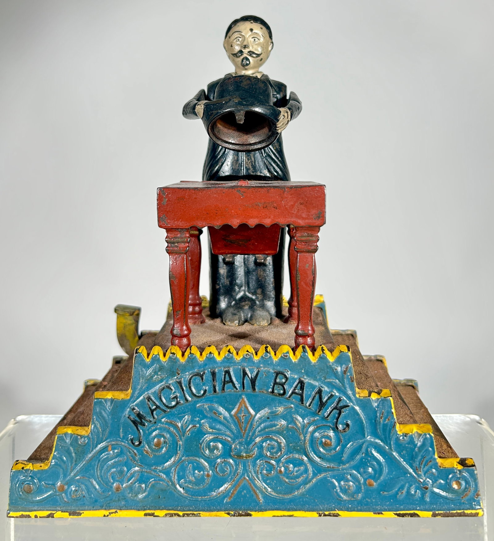 Magician Bank: J & E Stevens Co. - Cromwell, CT. 1890 - 8"T x 7"W - Peter Franco Collection