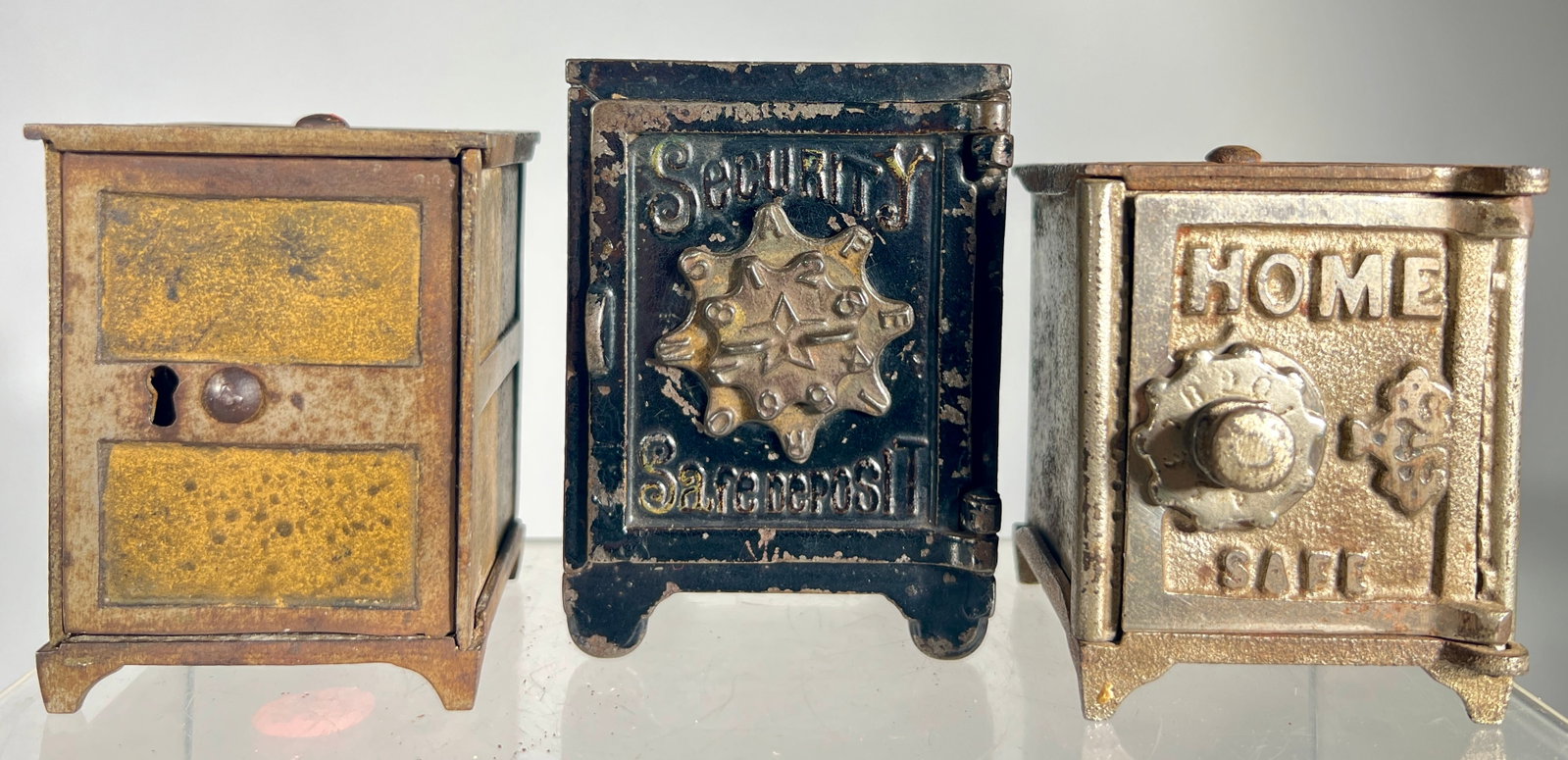 Three Cast Iron Safe Banks (1 of 2)
