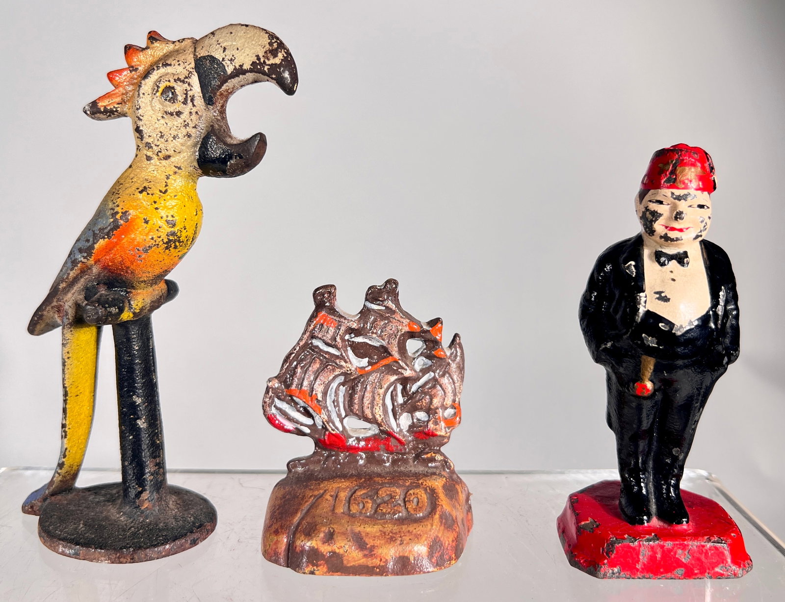 Cast Iron Paperweights/ Bottle Opener (1 of 2)