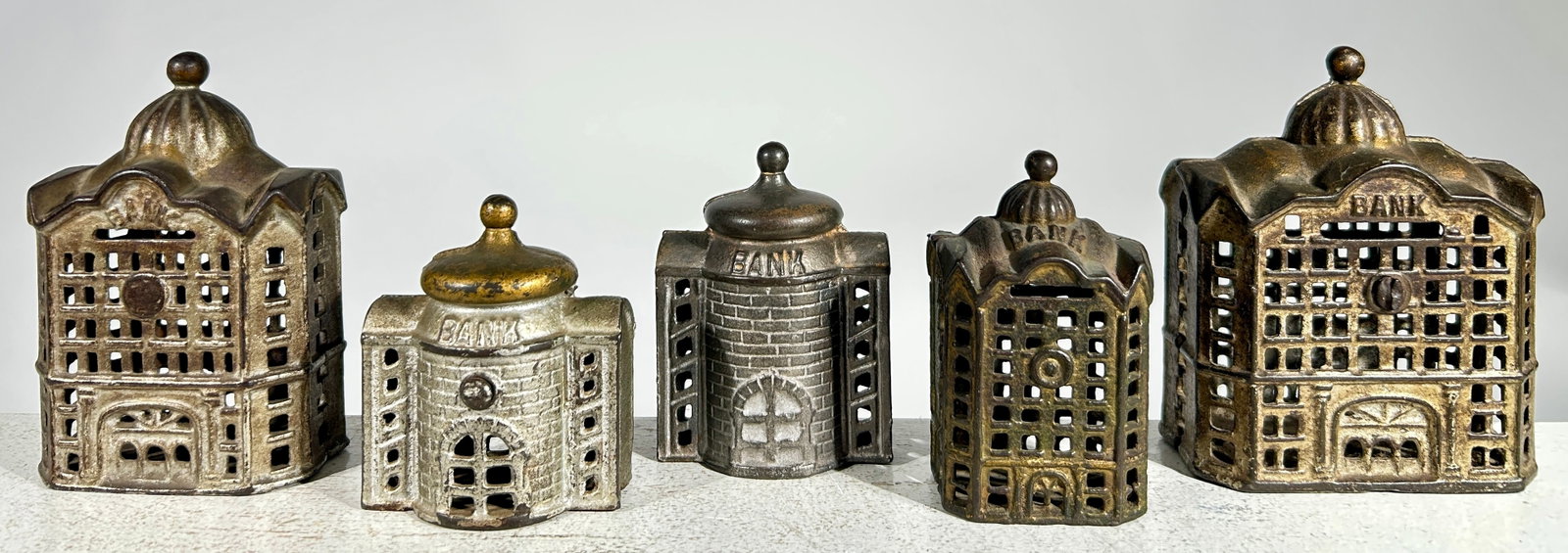 Five Assorted Cast Iron Building Banks: American 1920s - Tallest os 4 3/4" T