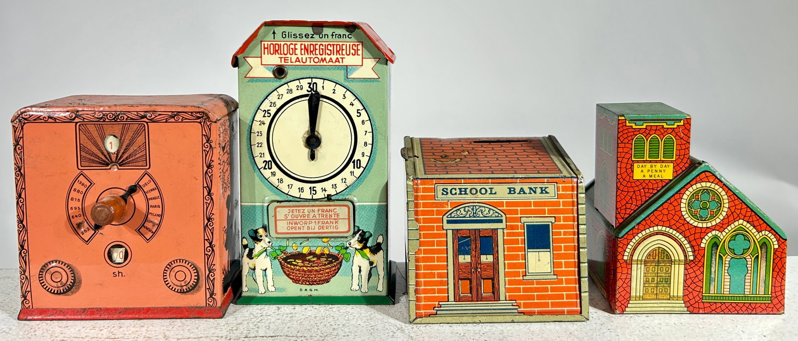 Group of Four Tin Banks (1 of 2)