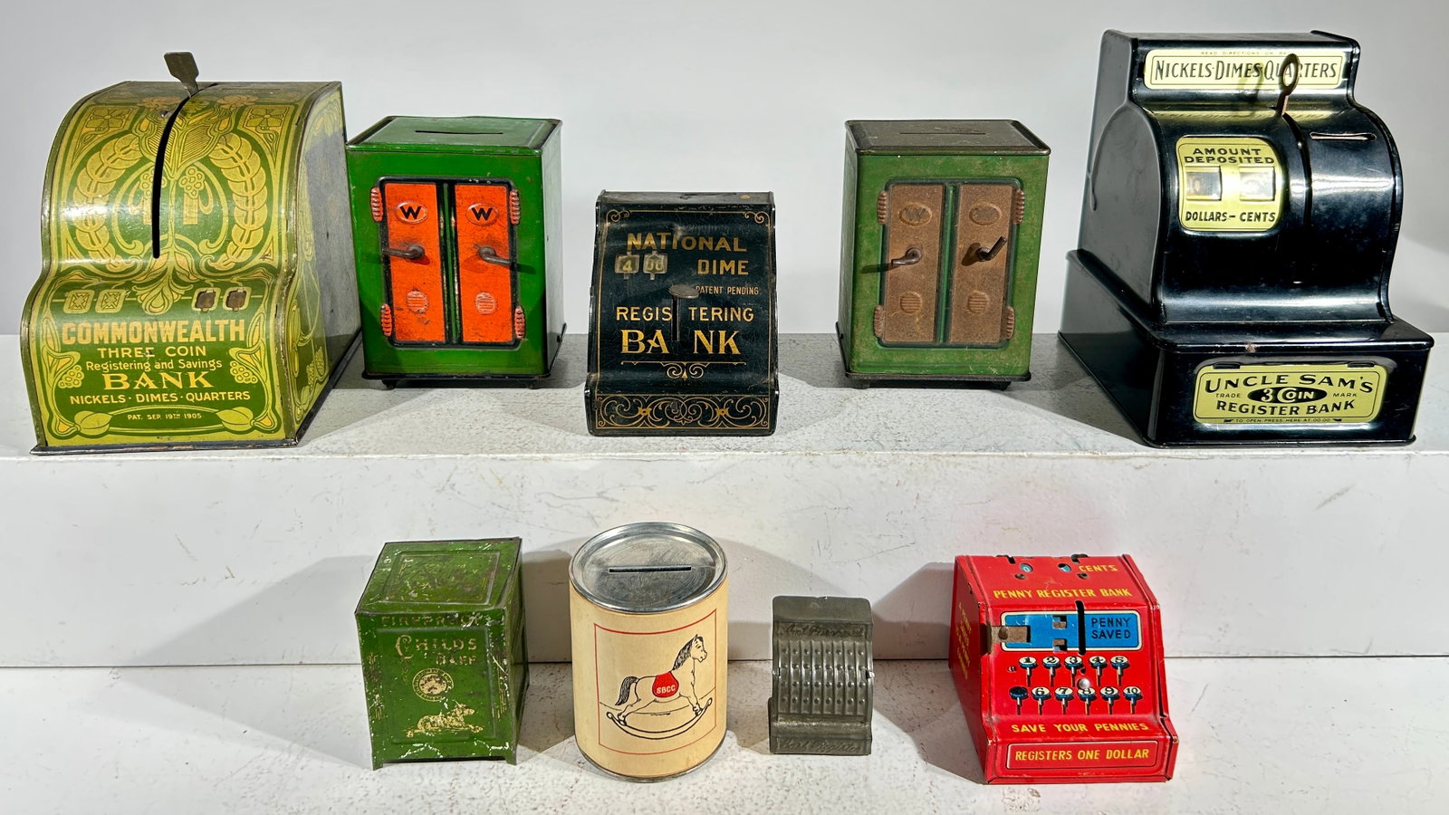 Nine Tin Still or Registering Banks - Five are Cash Register (1 of 2)