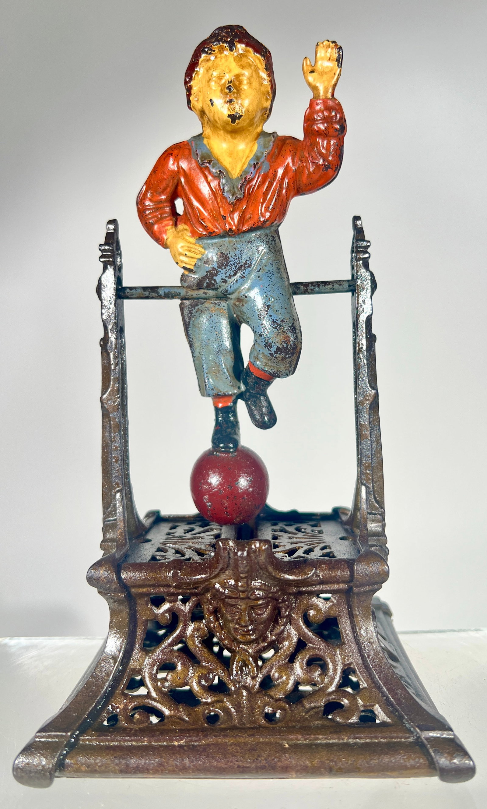 Boy on Trapeze Cast Iron Mechanical Bank (1 of 3)