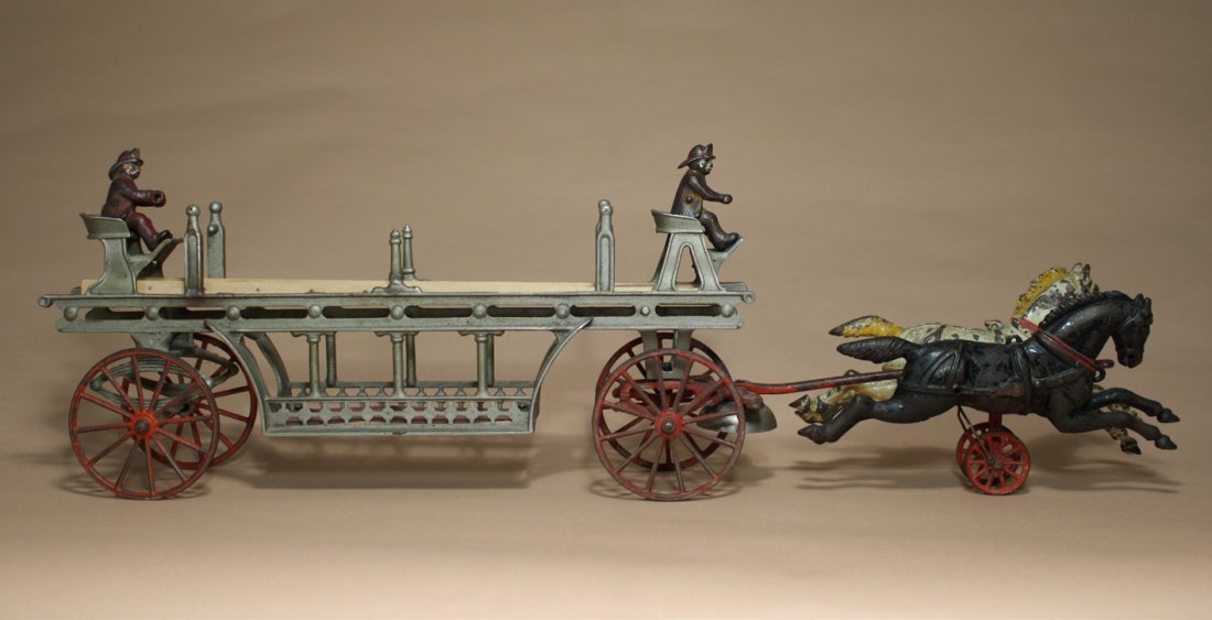 Hook & Ladder Ð Nickel Plated: Harris Toy Company Toledo, Ohio Ð Circa 1900 This classic fire toy is 26Ó long. Material: Cast Iron