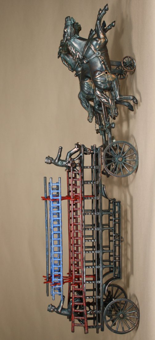 Oversized Hook & Ladder: Kenton Hardware Kenton, Ohio Ð Circa 1905 Another oversized electroplated toy by Kenton Hardware. This toy and the preceding one have resided in the same collection for the last 40 years. It is 35Ó 