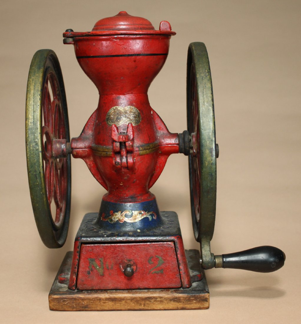 Enterprise #2 Coffee Grinder: Enterprise Mfg. Co. Philadelphia, Pennsylvania Ð Circa 1880 This is a diminutive #2 coffee grinder in pristine condition. It is 10Ó wide x 12 1/2Ó high x 9Ó deep. Material: Cast Iron and Wood