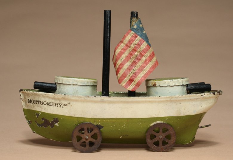 MontgomeryÓ Battleship: American Ð Circa 1900 This seems to employ a rubber band driven mechanism. Part of the Great White Fleet. Material: Tin