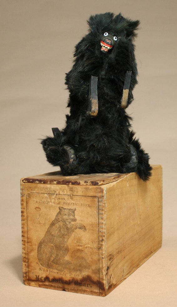 Clockwork Black Bear with Box: Ives, Blakeslee Company Bridgeport, Connecticut Ð Circa 1880 This is a classic Ives toy. It works sporadically. Material: Papier-m‰chŽ and Fur