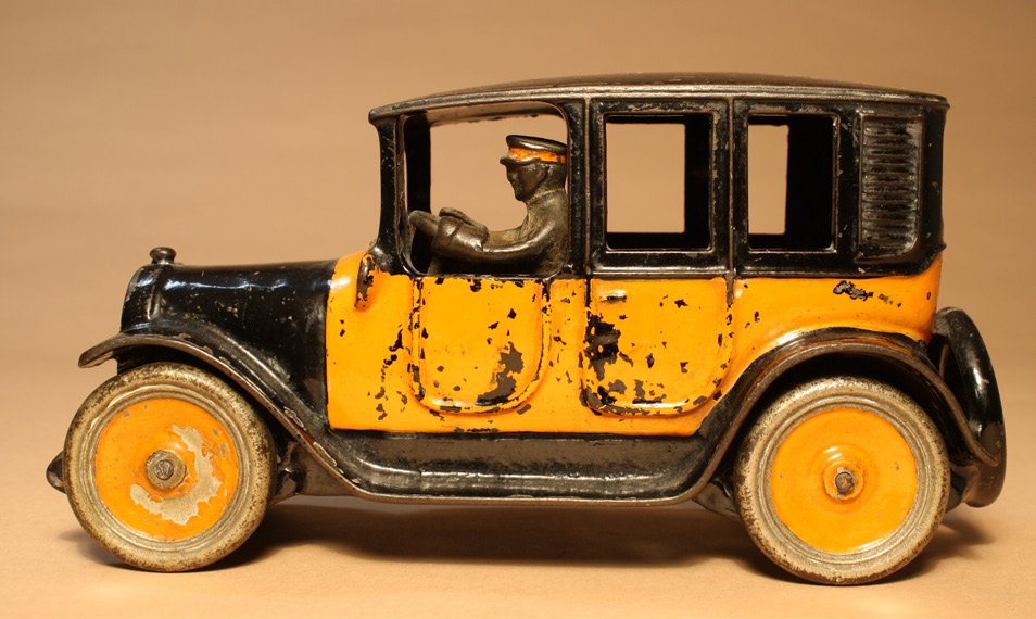 Yellow Cab Ð 9Ó Version: Arcade Mfg. Co. Freeport, Illinois Ð Circa 1925 The scarce 9Ó version of the toy. Material: Cast Iron