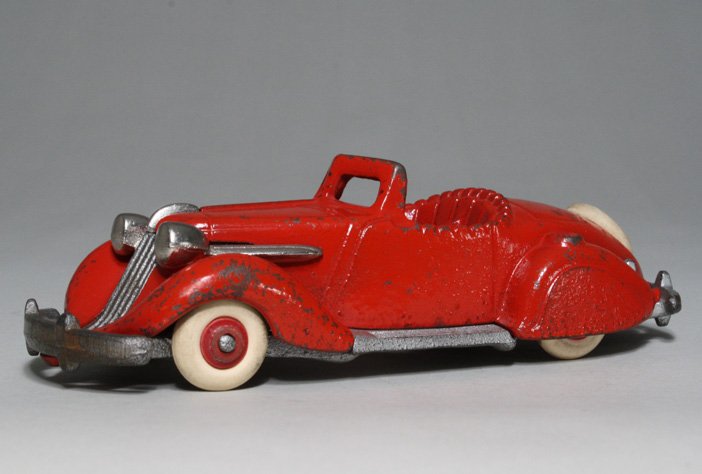 Studebaker Roadster: Hubley Toy Company Lancaster, Pennsylvania Ð Circa 1935 This is a scarce vehicle made during the art deco era. The toy is 6Ó long. Material: Cast Iron