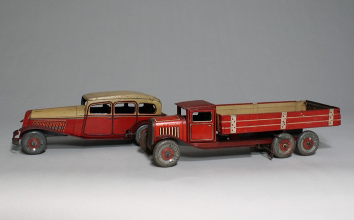 Lot: Windup Sedan and Flatbed Truck: Chad Valley Company England Ð Circa 1932 Both of these toys are still functioning and are 11Ó and 12 1/2Ó respectively. Material: Tin