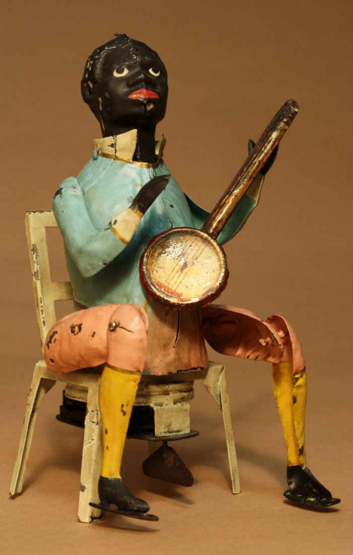 Banjo Player Gunthermann: German Ð Circa 1905 This is a wonderful condition hand painted windup musician. He works very well and still plays his music. Material: Tin