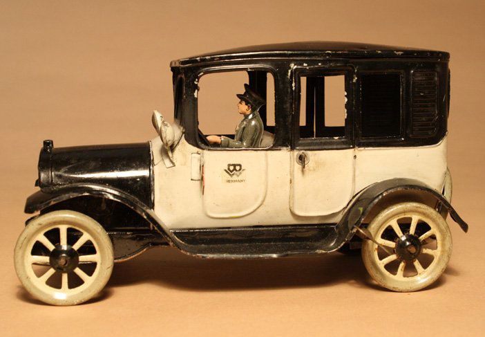 Taxi Cab Gebruder Bing: German Ð Circa 1920 This is a classic Bing toy that is 8Ó long and works very well. Material: Tin