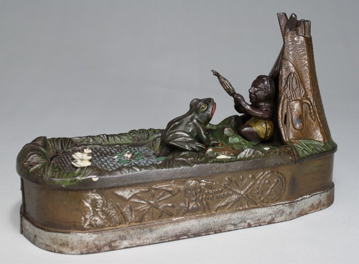 Chief Big Moon Bank Ð Tan Base: Made by the J. & E. Stevens Company Cromwell, Connecticut Ð Circa 1899 Charles BaileyÕs inspiration for ÒChief Big MoonÓ may have come from the frog pond adjacent to the Stevens foundry building. 