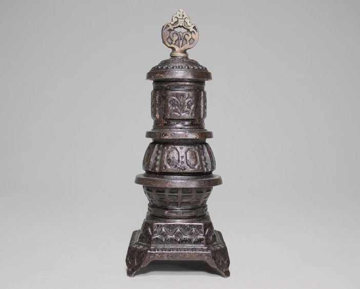 Parlor Stove American: Circa 1895 Material: Cast Iron