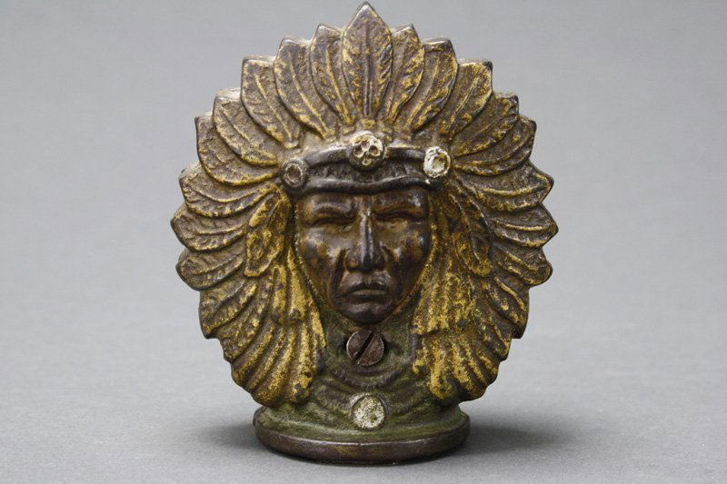 Two Faced Indian Still Bank: A. C. Williams Ravenna, Ohio - Circa 1905 This is a very scarce bank. This example is held together with a screw and nut (possibly replaced). Material: Cast Iron