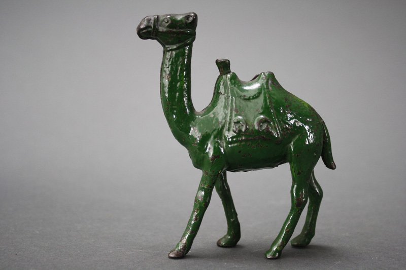 Camel - Small, Green Still Bank: A. C. Williams Ravenna, Ohio - Circa 1920 These little guys are almost always gold or silver. Very few are brightly painted like this one. Material: Cast Iron