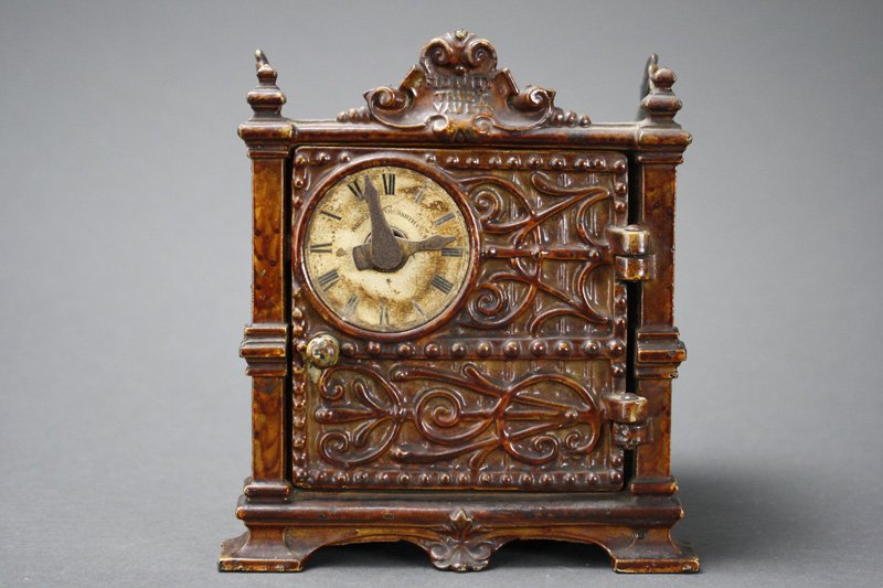 Fidelity Trust Vault Still Bank: J. Barton Smith Co. Philadelphia, Pennsylvania - Circa 1890 This is a wonderful example of the bank with many highlights. Material: Cast Iron and Paper Dial