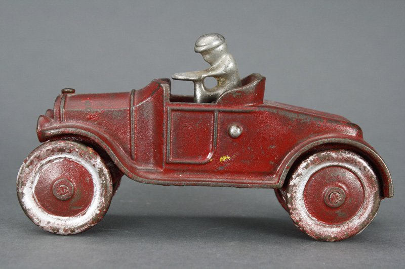 Open Roadster / Race Car: Kenton Hardware Kenton, Ohio - Circa 1920 This is an attractive early race car that is 6” long. Material: Cast Iron