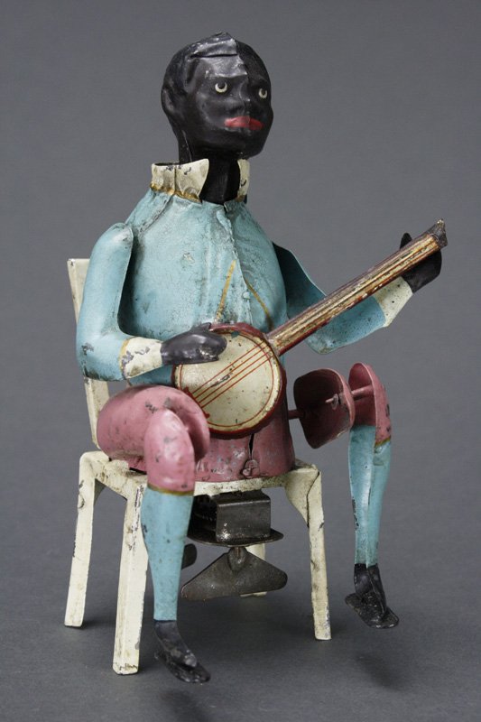 Banjo Player Guntermann: Germany - Circa 1905 This is a wonderful toy by Guntermann. He works quite well. Material: Tin