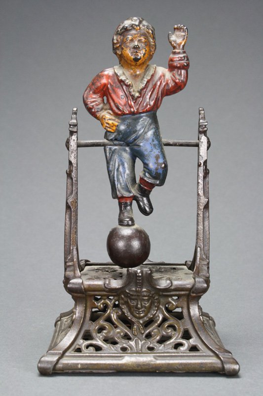 Boy on Trapeze Mechanical Bank: Made by the J. Barton Smith Company Philadelphia, Pennsylvania – Circa 1890 The only mechanical bank produced by J. Barton Smith Company of Philadelphia, Pennsylvania circa 1890. The bank was origin